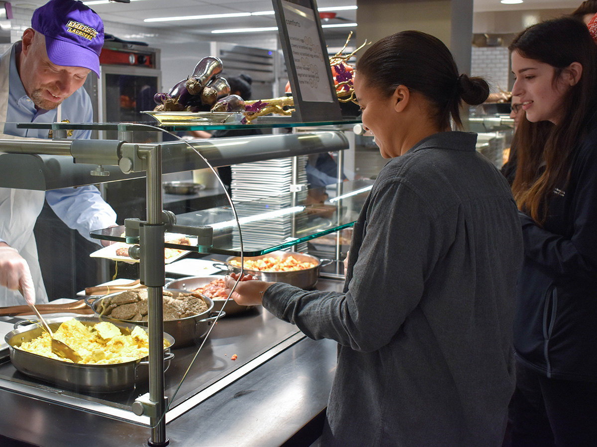 serving breakfast to students
