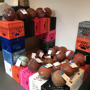 Old basketballs decorated by youth that will be part of the public art sculpture Gestures of Incompleteness.