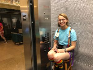 A student in an elevator