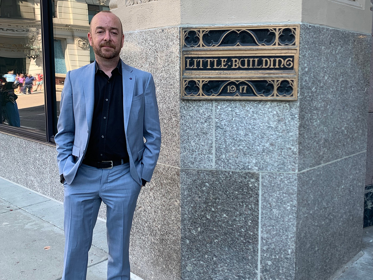Ross Cameron in front of Little Building