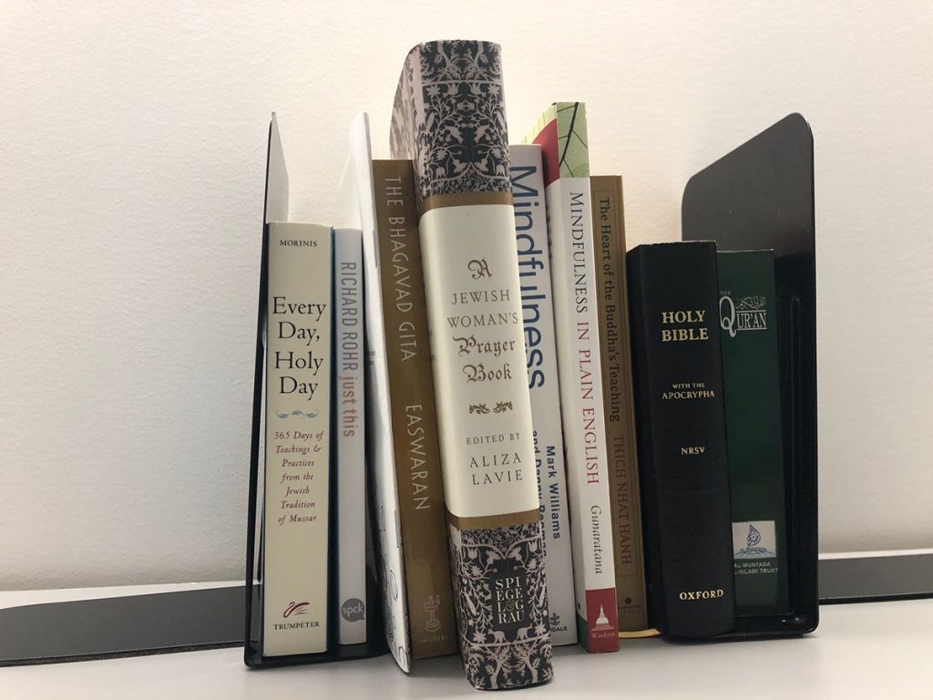 Books from numerous faiths located in Emerson College's Center for Spiritual Life.
