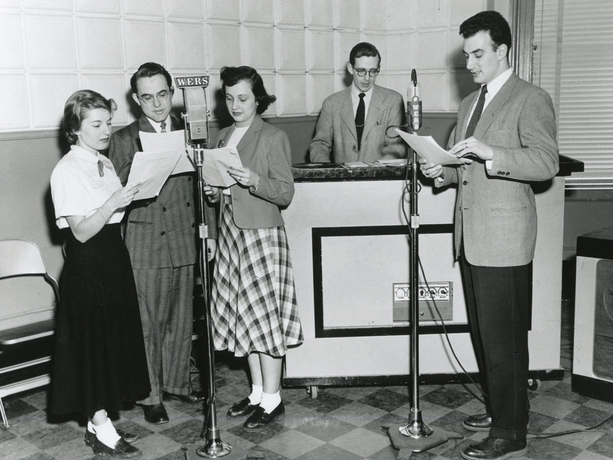 Five people participate in a WERS broadcast in 1949, the station's first year.