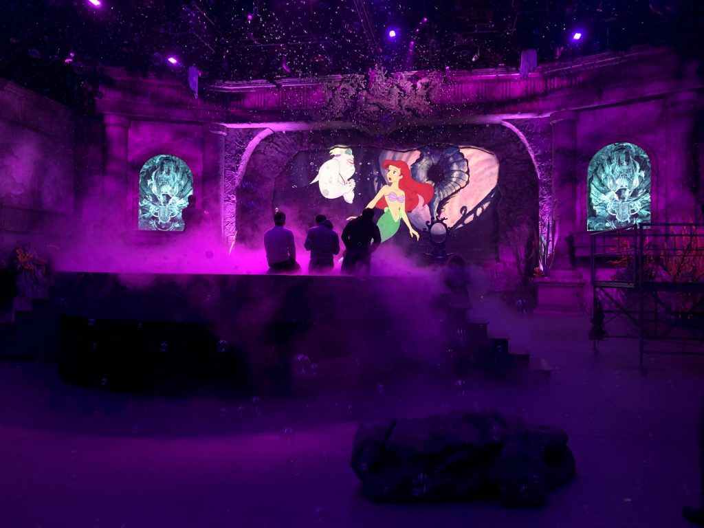 Mist rises from the set of The Little Mermaid Live!
