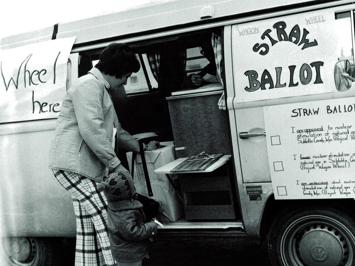 Residents use a Volkswagen van to conduct a straw poll as to whether residents supported the Wagon Wheel Project. (Photo courtesy of Gregory Asay)