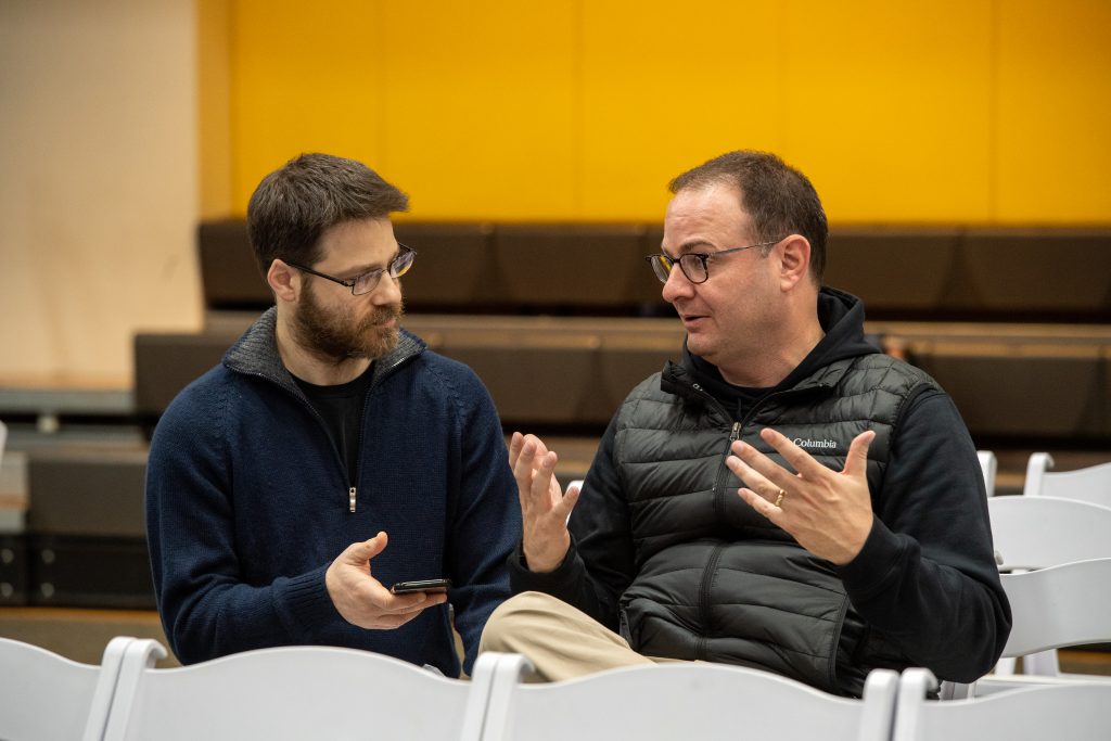 Adrian Wojnarowski speaks with Emerson Today's David Ertischek before the live taping of the Woj Podcast on Dec. 5, 2019. (Photo by Derek Palmer for Emerson College)