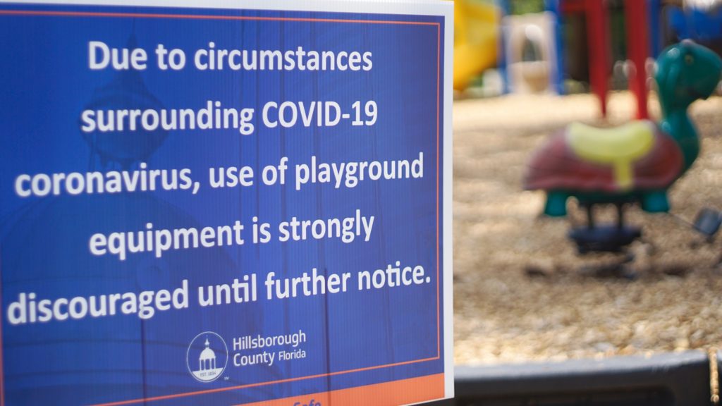 Park closure sign at an playground in Florida following the COVID-19 outbreak in the US. 