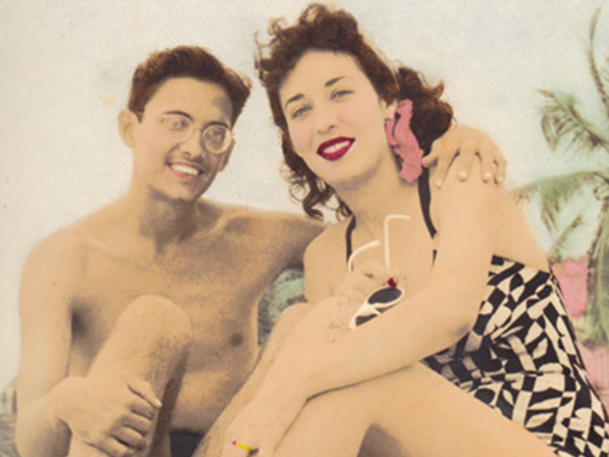 man and woman on beach, 1940s