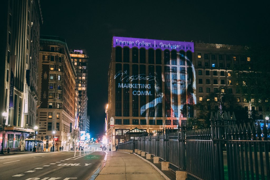 A projection of a student with their signature on the Little Building