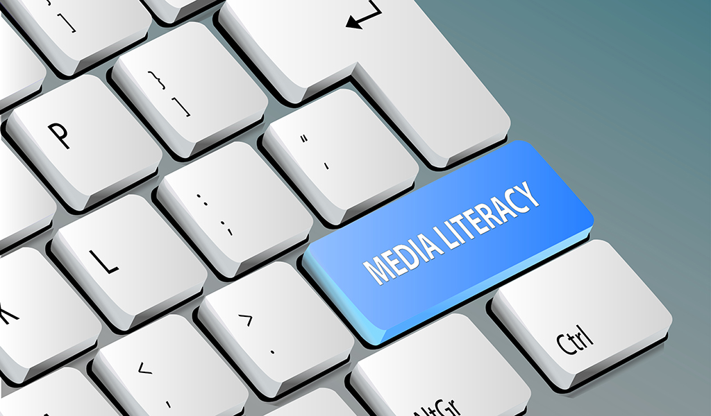 "media literacy" as a key on computer keyboard