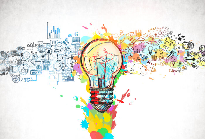 graphic of light bulb over multicolored paint splatters and several small drawings of gears and images related to business and creativity