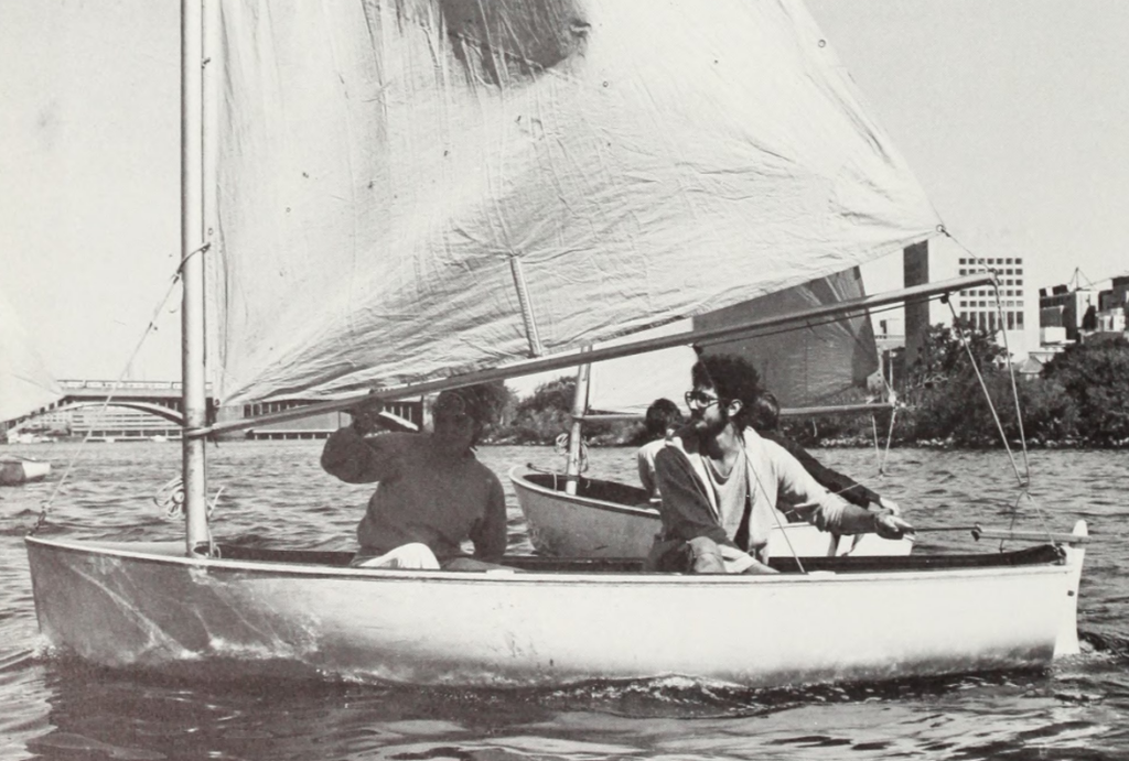 Two men in small sailing boat