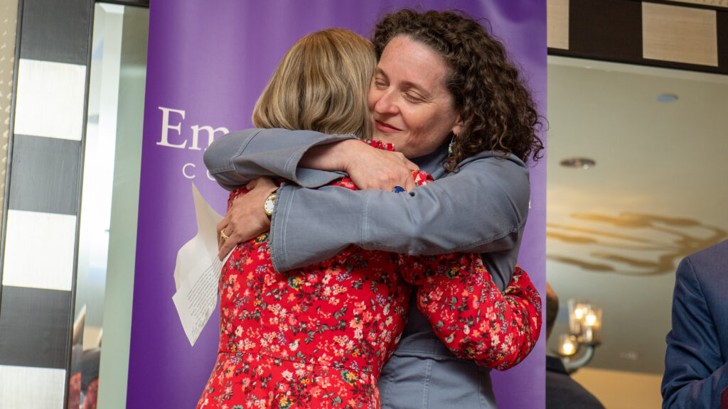 Ruth Grossman hugs Meghan Baer