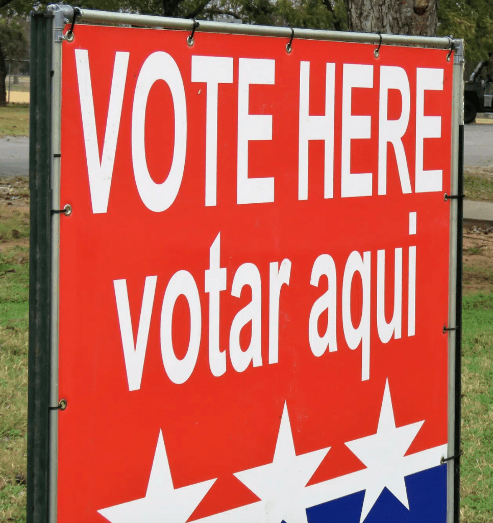 Sign that reads: vote here