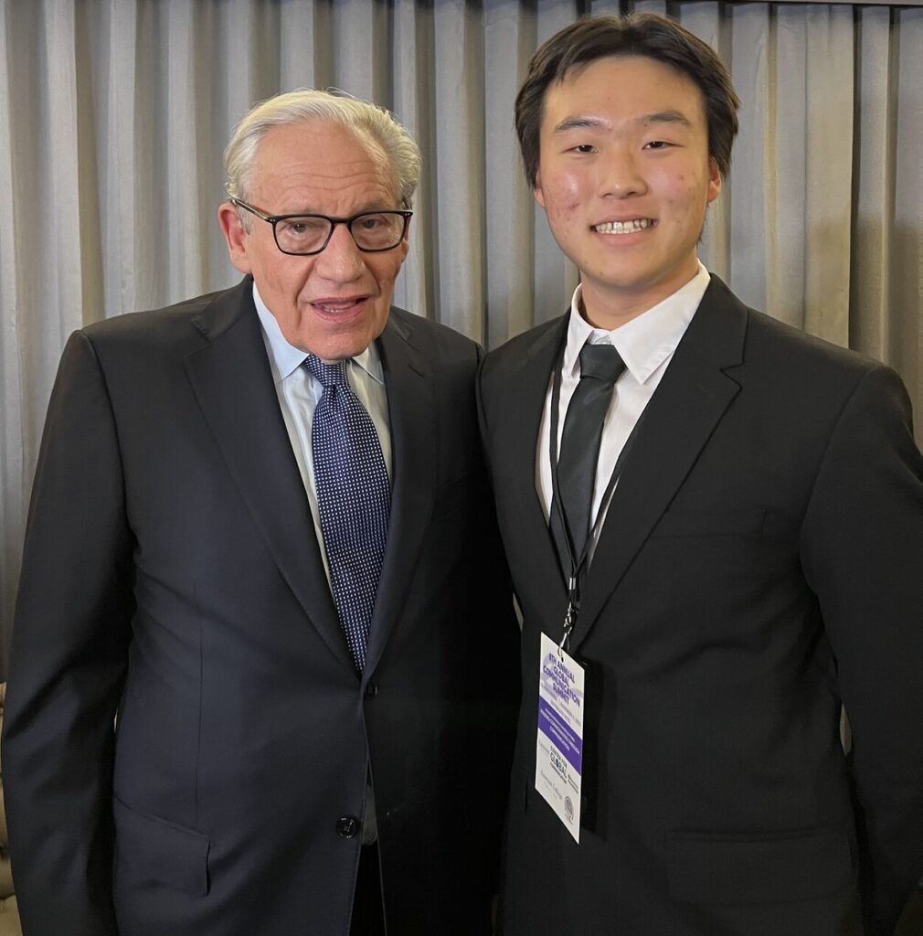 Bob Woodward stands with Colin Han.