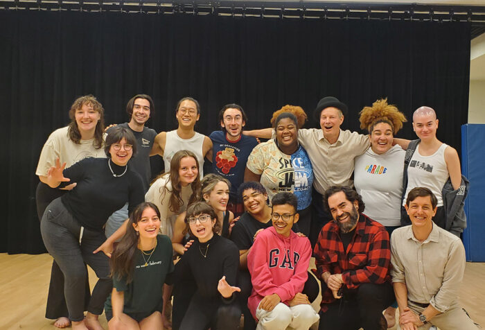 Bill Irwin and class pose in rehearsal space