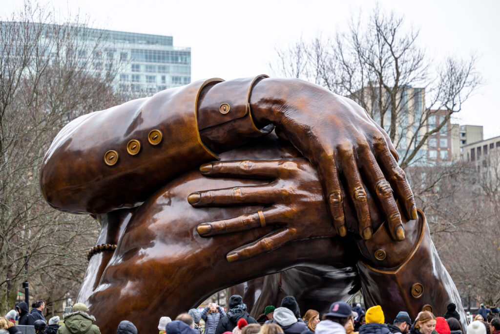 The Embrace statue is a large bronze sculpture of two hands symbolizing the hug between Dr. Martin Luther King Jr. and Coretta Scott King they shared after he won the 1964 Nobel Peace Prize