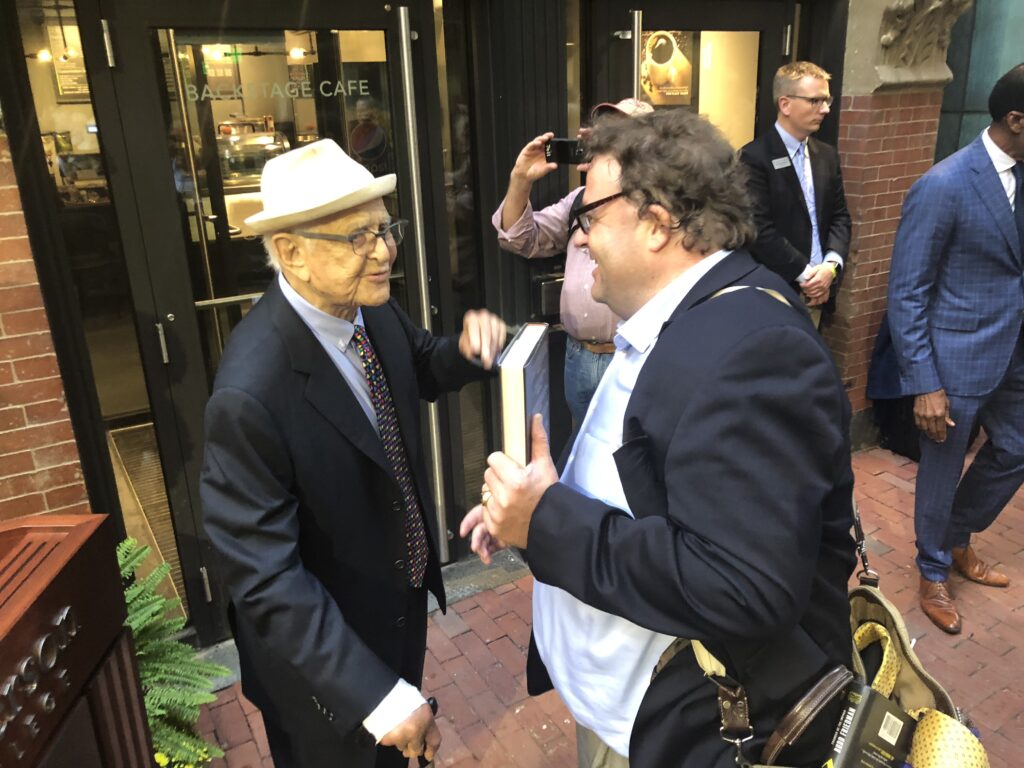 Norman Lear and Tripp Whetsell talk during the unveiling of the Lear statue on Boylston Place.