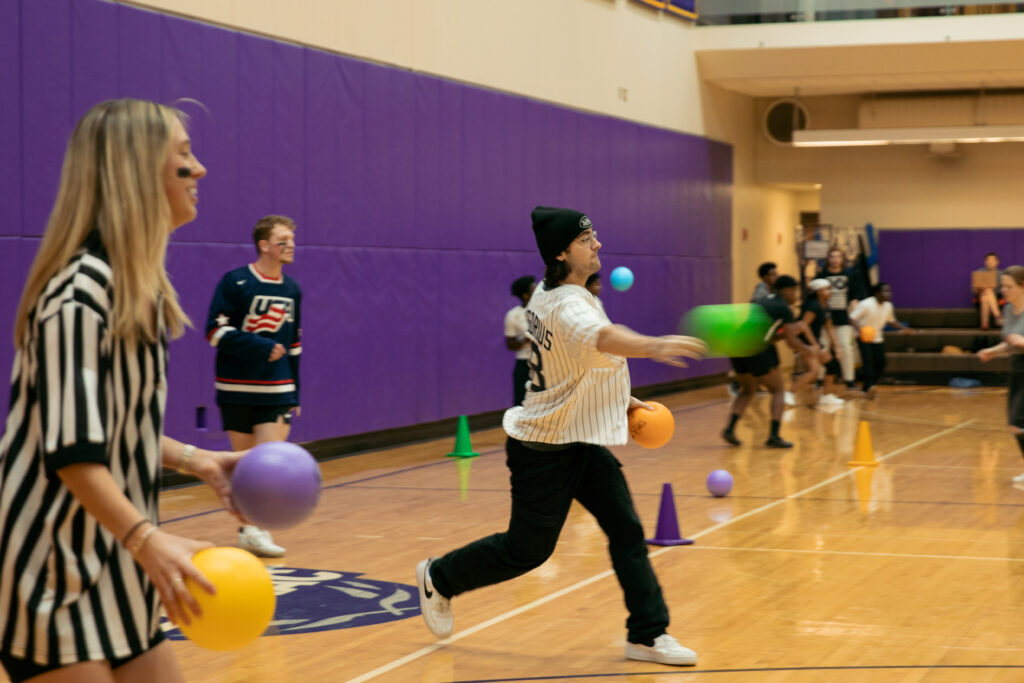 A person sidearms a dodgeball