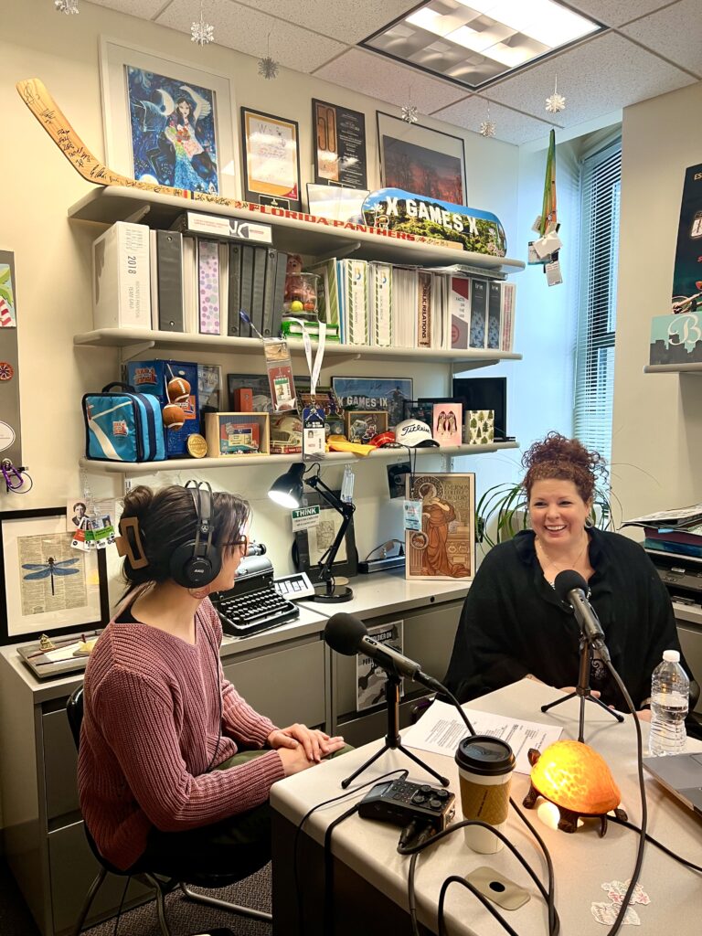 Ashley Osmecki and Maria Scott working on the podcast