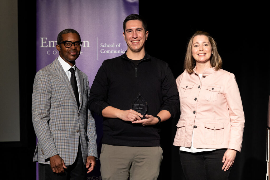SOC Dean Brent Smith poses next to Alan Geiss ’23 and Brenna McCormick, Director, Business of Creative Enterprises (BCE), Graduate Program Director, Strategic Marketing Communication (SMC) Senior Executive-in-Residence after Geiss received the Award for Most Valuable Peer in Graduate. 