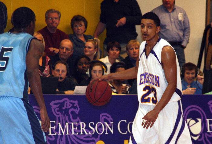 Will Dawkins dribbles during an Emerson game