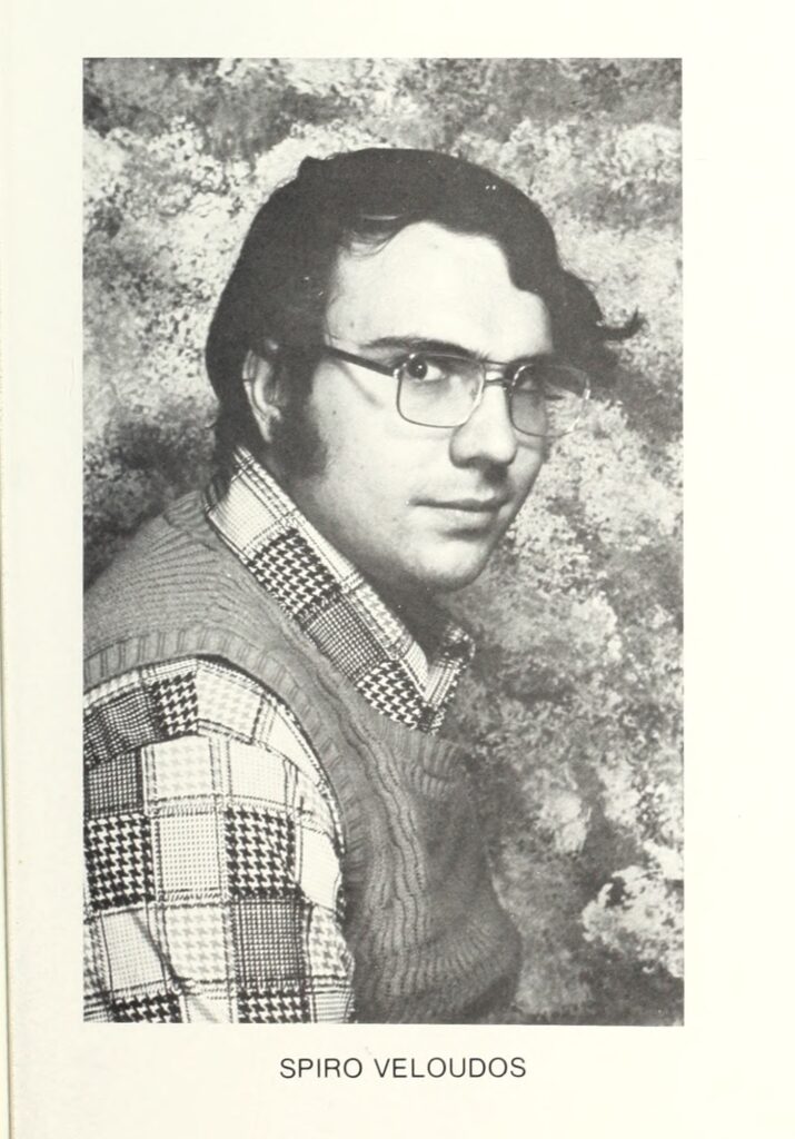 Spiro Veloudos yearbook photo in black and white, wearing checked shirt and sweater vest