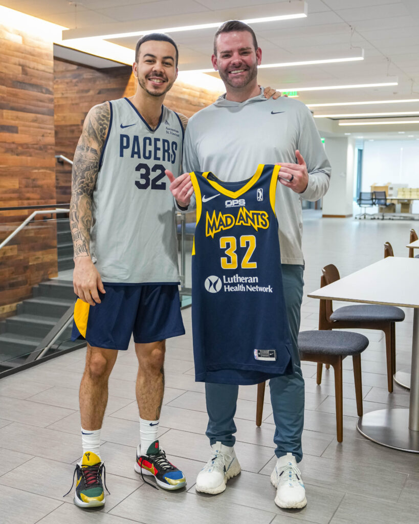 Professional basketball player Gabe York with Chris Taylor