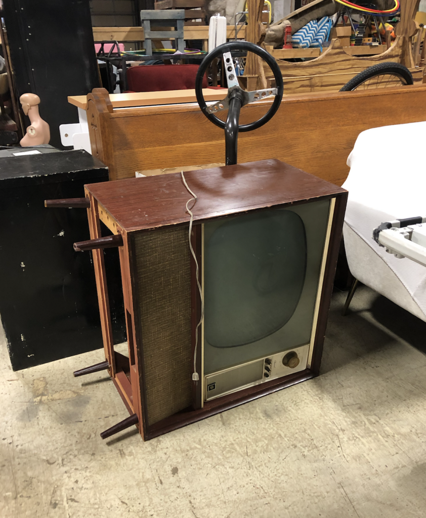 An old box TV on its side