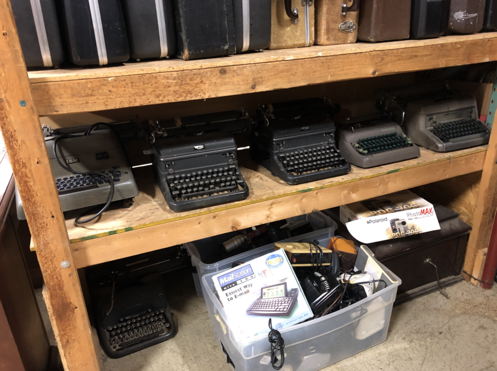 A shelf of typewriters