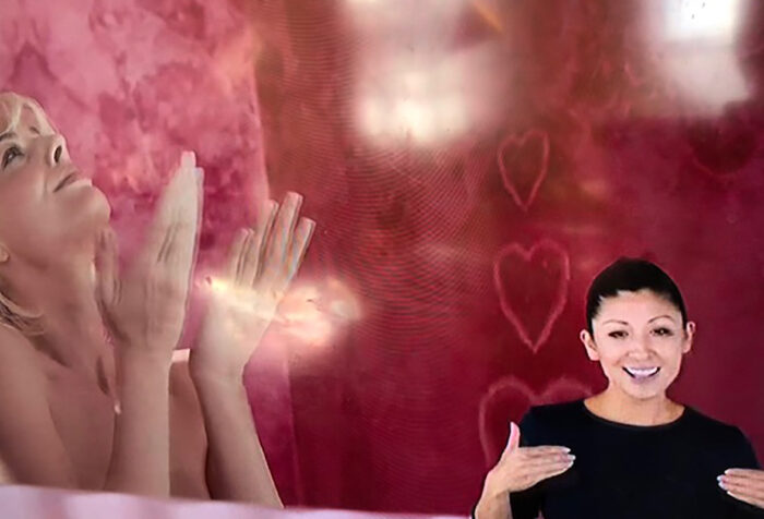 ASL performer Leila Hanaumi signs in the lower right hand corner of the 'Barbie' movie