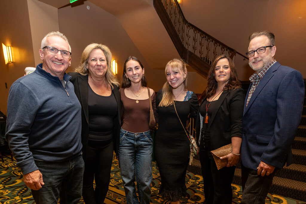 STUDENT SCHOLARS & CREATORS SHOWCASE; Academic Excellence Award nominee Emma Brady ’25 and Student Scholars & Creators Showcase presenter, Lauren Pruner ’25, with their parents.