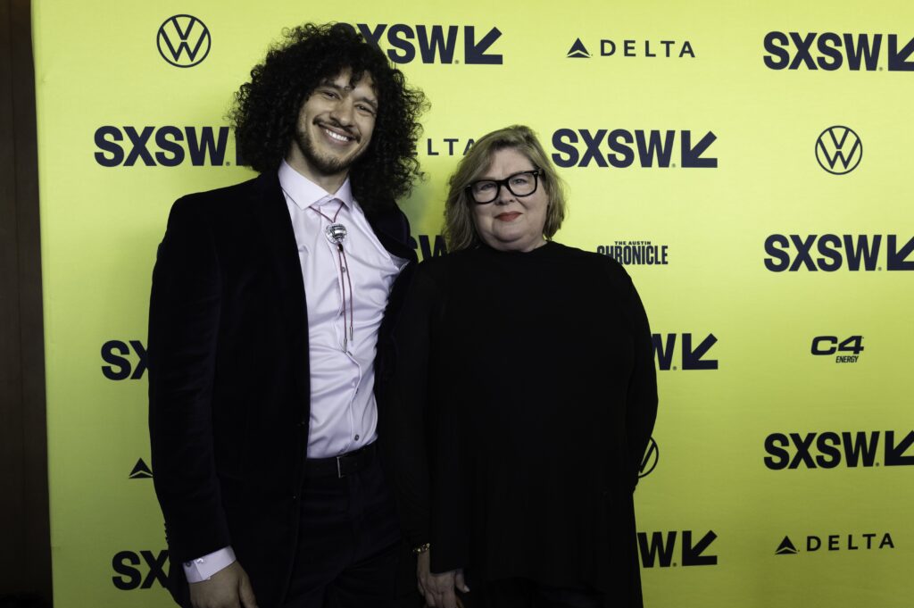 Edgar Rosa and Tamara Elwell with a SXSW background