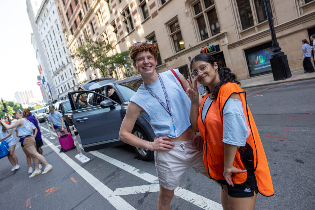 Two orientation leaders stand together