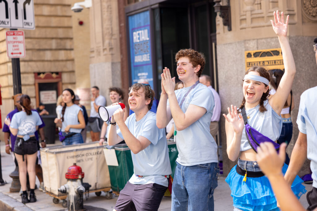 Orientation leaders cheer along Tremont Street