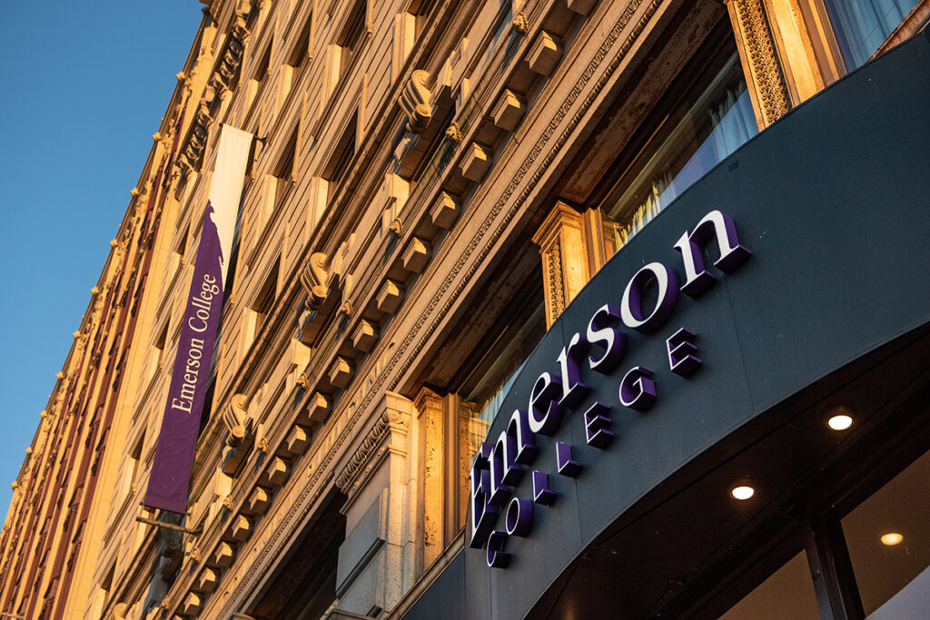 photo of building facade showing a marquis reading Emerson College and a banner on side of building reading Emerson College