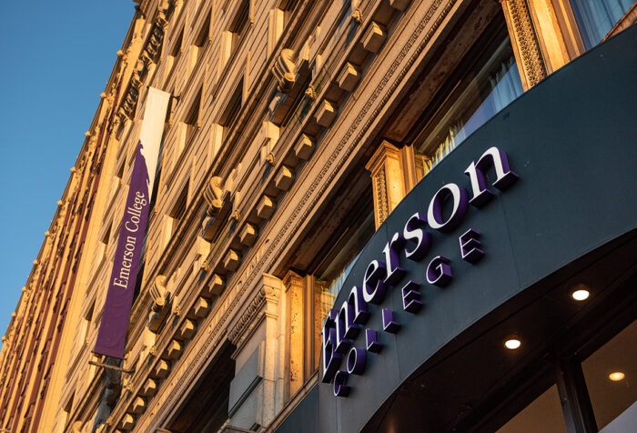 photo of building facade showing a marquis reading Emerson College and a banner on side of building reading Emerson College