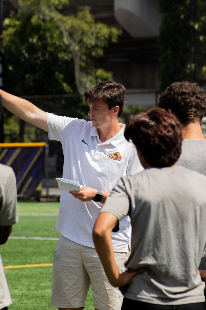 Coach McKersie talks to the team