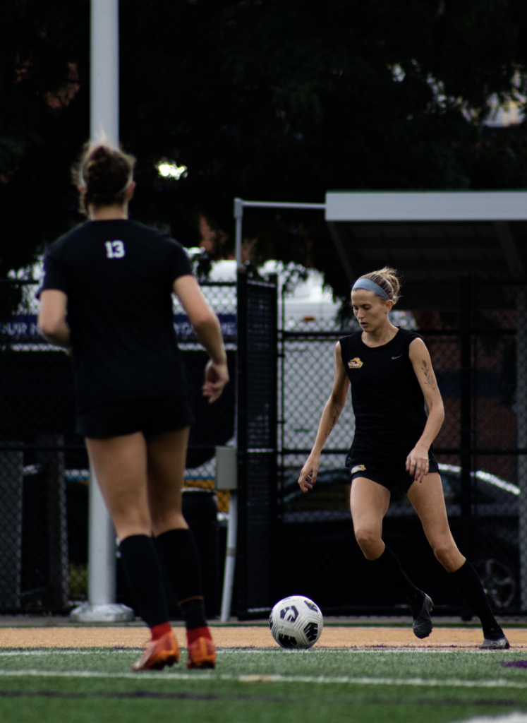 Anna Swisher dribbles the ball