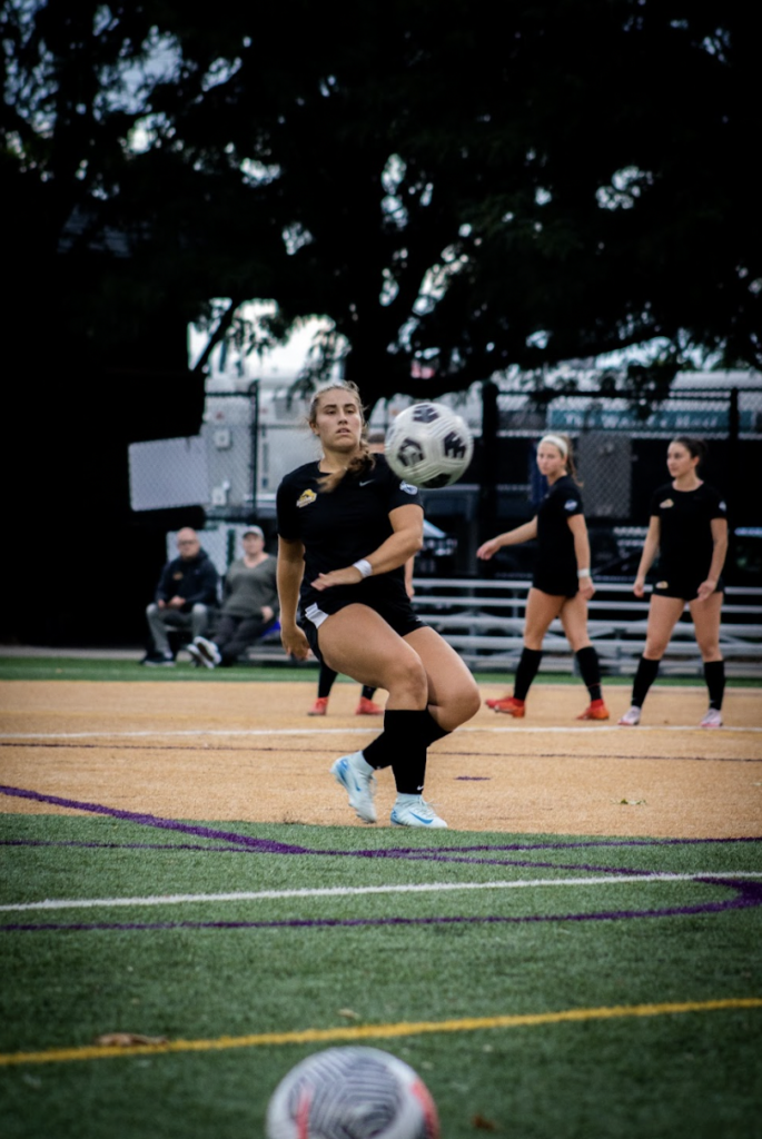 A player kicks the ball