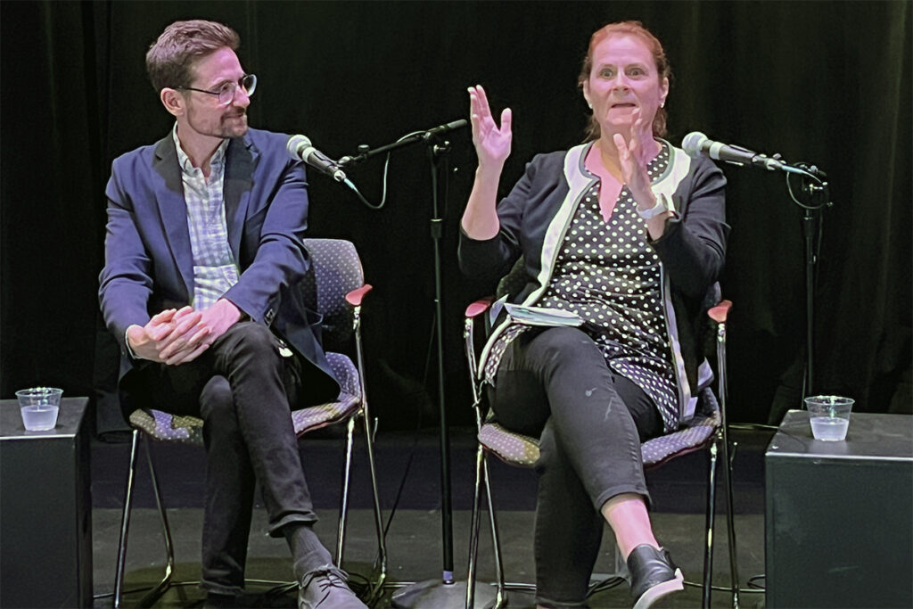 Matthew McMahan and Patrice Oppliger speak on stage