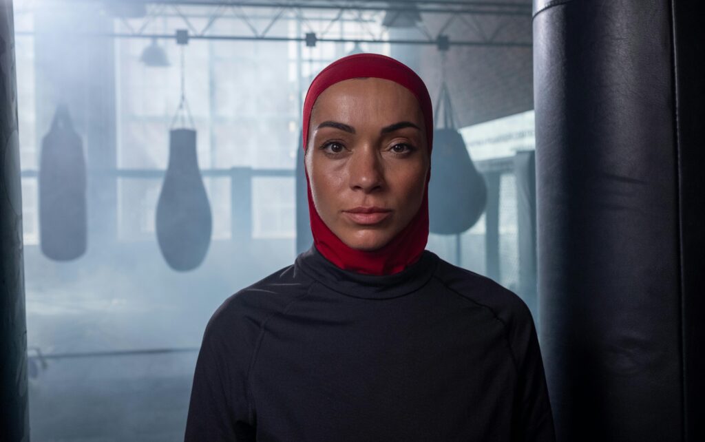 Woman wearing a sports hijab in a boxing gym