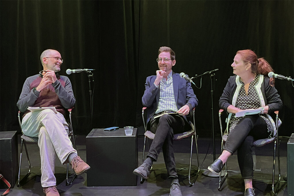 Joshua Polster, Matthew McMahan, and Patrice Oppliger on stage.