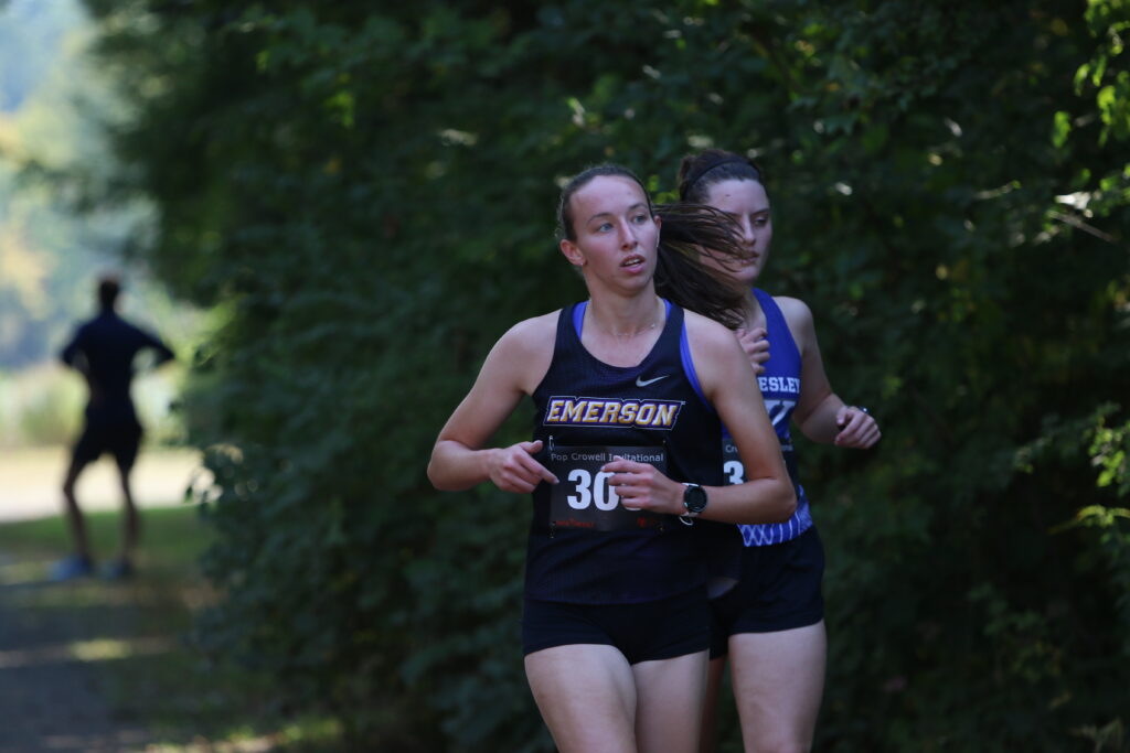 Sam Zanonnotti runs ahead of another runner