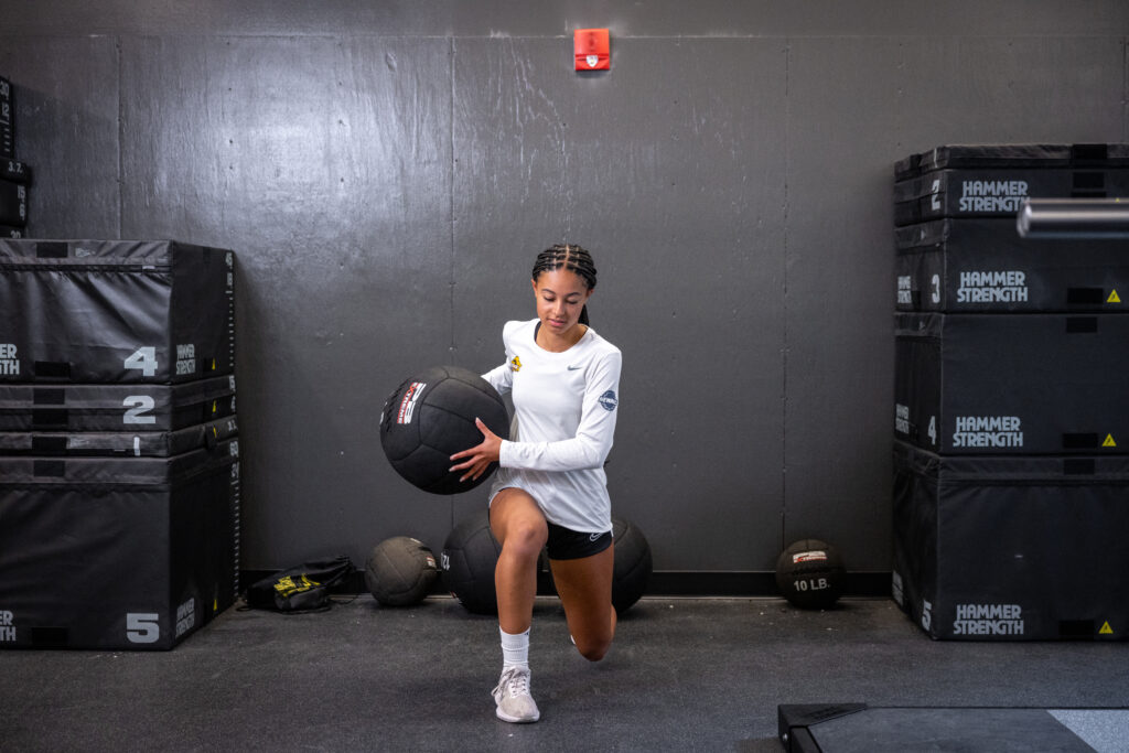 Sienna Parker works out with a medicine ball