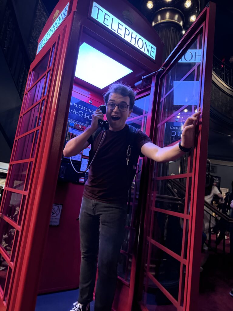 Alex Serino in a prop telephone booth for the Broadway show 'Harry Potter and the Cursed Child'