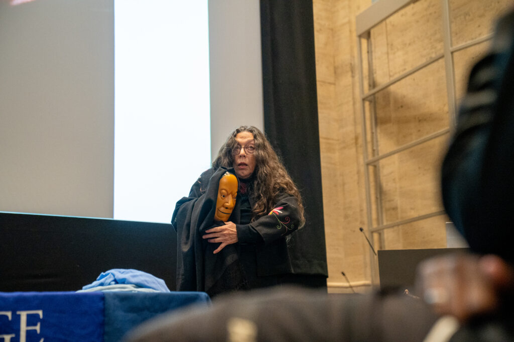 Alicia Martínez Álvarez displays one of her masks