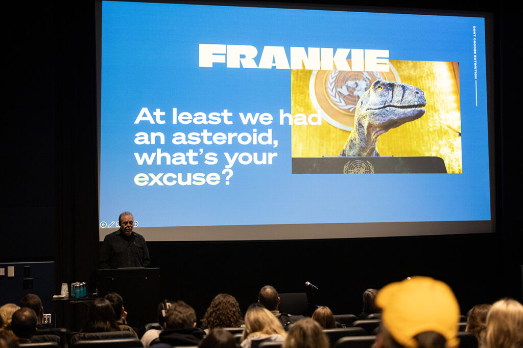 Screen featuring photo of CGI dinosaur, reading "Frankie. At least we had an asteroid, what's your excuse?"