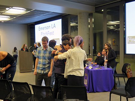 Tommaso Di Blasi hugging Jordan Gustafson