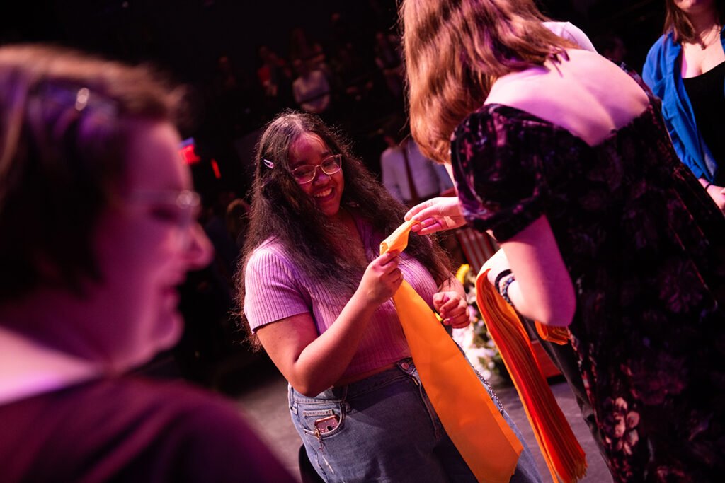 Student receiving sash. 