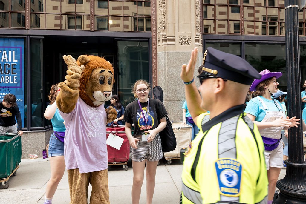 Griff the Lion and Boston Police Officer